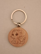 Porte-clé bois rond - Bébé dragon